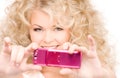 Happy woman using phone camera Royalty Free Stock Photo