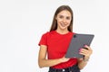 Happy woman using tablet. Smiling woman with tablet pc, isolated on grey background Royalty Free Stock Photo