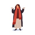 Happy woman in warm clothes enjoying winter. Female standing, wearing outerwear, coat and scarf, gesturing with hands in