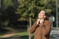 Happy woman warmly clothed in winter breathing fresh air Royalty Free Stock Photo
