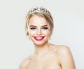 Happy woman with wedding hairstyle and diamonds diadem smiling, fashion portrait Royalty Free Stock Photo