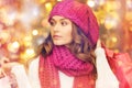 Happy woman in winter clothes with shopping bags Royalty Free Stock Photo