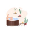 Happy woman in wooden bathtub, drinking tea at spa salon Royalty Free Stock Photo