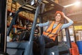 Happy woman worker warehouse staff forklift driver happy smiling enjoy working Asian people Royalty Free Stock Photo
