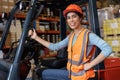 Happy woman worker warehouse staff forklift driver happy smiling enjoy working Asian people Royalty Free Stock Photo