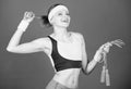 Happy woman workout with jump rope. Sporty woman training in gym. Health diet. Shaping success. Strong muscles and power