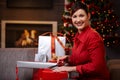 Happy woman wrapping christmas presents Royalty Free Stock Photo
