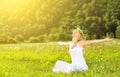 Happy woman in wreath outdoors summer enjoying life