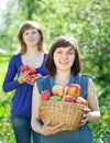 Happy women with apple harvest Royalty Free Stock Photo