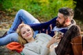 Happy woman and bearded man drink mulled wine. camping and hiking. cheers. love date and romance. Family picnic. Love Royalty Free Stock Photo