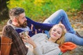 Happy woman and bearded man drink mulled wine. camping and hiking. cheers. love date and romance. Family picnic. Love Royalty Free Stock Photo