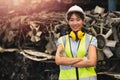 Happy women engineer Asian worker female work in factory portrait smile standing arm fold confidence look