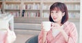 Women chat and enjoy coffee