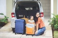 Happy woman and her daughter ready for vacation