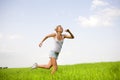 Happy women runing in field Royalty Free Stock Photo