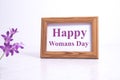 Happy Women`s Day background with purple flowers. 8 March concept.