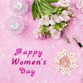 Happy Women`s Day greeting card with woman fashion accessories, jewelry, cosmetics, coffee and flowers. Top view Royalty Free Stock Photo