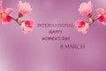 Happy Women`s Day,March 8 Lattering with spring branchs on blurred background