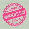 Happy Women`s Day rubber stamp baby pink on a Retro grey background. Royalty Free Stock Photo