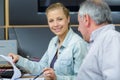 happy women at table with colleague Royalty Free Stock Photo