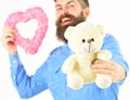 Happy Womens day concept. Bearded man with romantic presents for his wife on Womens day.