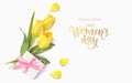 Happy Womens Day. 8 March design template. Calligraphic lettering text with decorative gift box and yellow tulip flowers. Flat lay Royalty Free Stock Photo