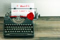 Happy Womens Day vintage typewriter paper red rose flower Royalty Free Stock Photo