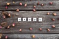 Happy Word Is Made Of Bright Wood Cubes On A Dark Wooden Background