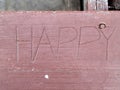 HAPPY word on hardwood sign Royalty Free Stock Photo