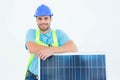 Happy worker leaning on solar panel Royalty Free Stock Photo