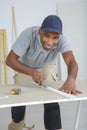 happy worker using craft knife Royalty Free Stock Photo