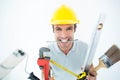 Happy worker with various equipment Royalty Free Stock Photo