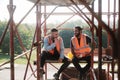 Happy Workers In Construction Site During Lunch Break Royalty Free Stock Photo