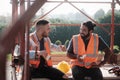 Happy Workers In Construction Site During Lunch Break Royalty Free Stock Photo