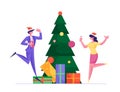 Happy Workers Having Fun. People Celebrate Xmas Party in Office Dancing at Decorated Christmas Tree with Gifts