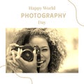 Happy world photography day text on white with happy biracial woman using camera in sunshine Royalty Free Stock Photo