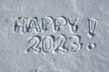 Happy 2023 written in the snow