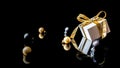 Happy xmas. White gift box with golden ribbon, New Year balls and winter tree in Christmas composition on black background for Royalty Free Stock Photo