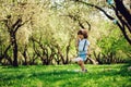 Happy 3 years old child boy catching butterflies with net on the walk in sunny garden or park. Spring and summer outdoor activitie Royalty Free Stock Photo