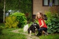 happy 8 years old child girl playing with her spaniel dog Royalty Free Stock Photo