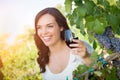 Happy Young Adult Woman Enjoying Glass of Wine Tasting In The Vineyard Royalty Free Stock Photo