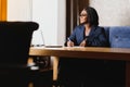 Happy young african american businesswoman using computer in office Royalty Free Stock Photo