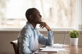 Happy young african american guy visualizing future, weekend or vacation time. Royalty Free Stock Photo