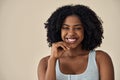 Happy young African American woman beauty model at beige background. Portrait. Royalty Free Stock Photo