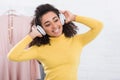 Happy young african american woman listening music Royalty Free Stock Photo