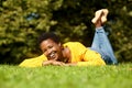 Happy young african american woman relaxing in park Royalty Free Stock Photo