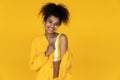 Happy african american girl wear stylish yellow clothes isolated on background