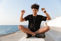 Happy young african teenager at the beach Royalty Free Stock Photo