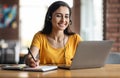 Happy young arab woman having educational course online Royalty Free Stock Photo