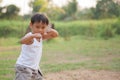 Happy young asia boy playing kungfu having fun Royalty Free Stock Photo